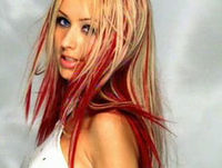 Aguilera in the music video for "Come on Over Baby (All I Want Is You)".