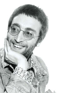 John Lennon, early 1970; his Beatle locks shorn - as were Yoko's - for a charity auction.
