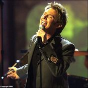 Aiken singing at the 2003 Billboard awards
