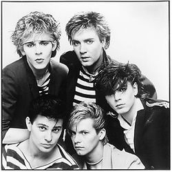 In 1981, Duran Duran consisted of Nick Rhodes and Simon Le Bon (rear), and the unrelated Taylors: Roger, Andy, and John (front).
